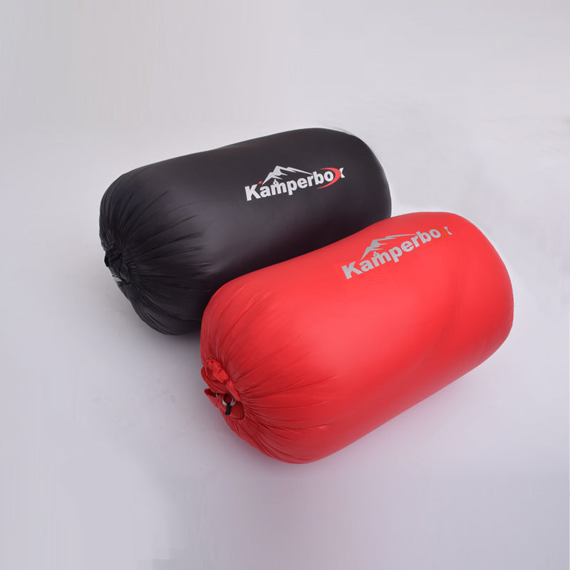 Load image into Gallery viewer, Black and red sleeping bags with Kamperbox logo on a light gray background
