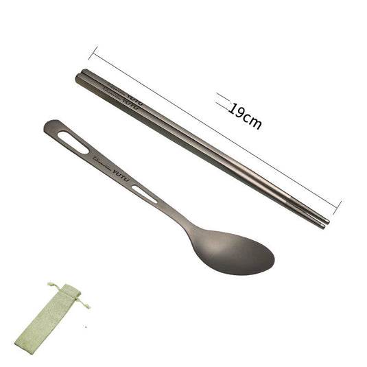 Set of stainless steel spoon, chopsticks, and pouch on a white background