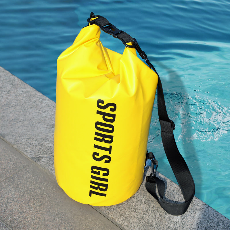 Load image into Gallery viewer, Yellow waterproof bag with &#39;SPORTS GIRL&#39; text by a pool
