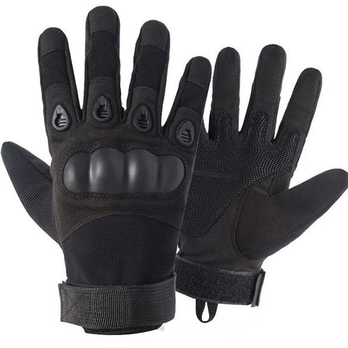 Pair of black tactical gloves on a white background