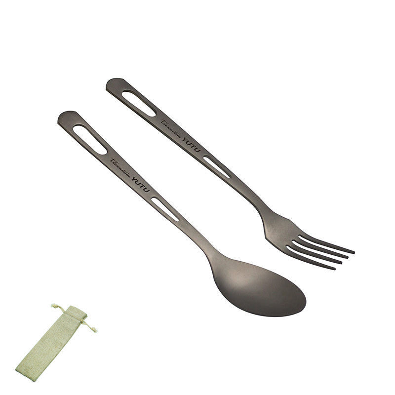 Load image into Gallery viewer, Silver spoon and fork set with a green pouch on a white background
