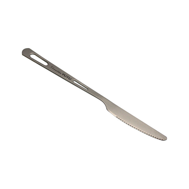 Load image into Gallery viewer, Stainless steel knife with serrated edge on a white background
